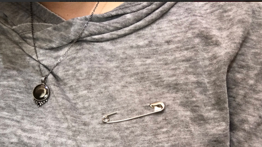 why are people wearing safety pins