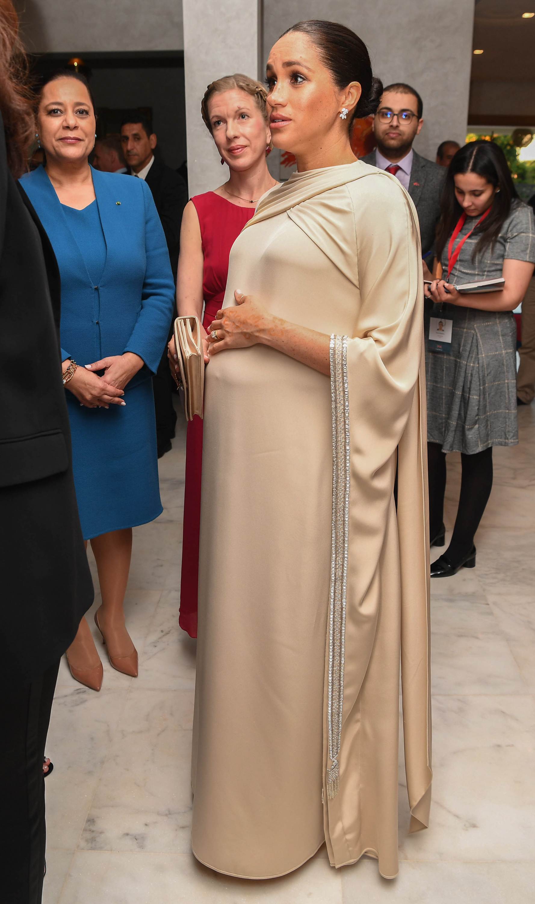 Pregnant Meghan Markle Looks Angelic In Stunning Kaftan Style Gown In
