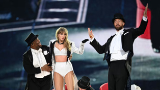 Taylor Swift was joined by Travis Kelce on stage during her London show. Photo / Getty Images